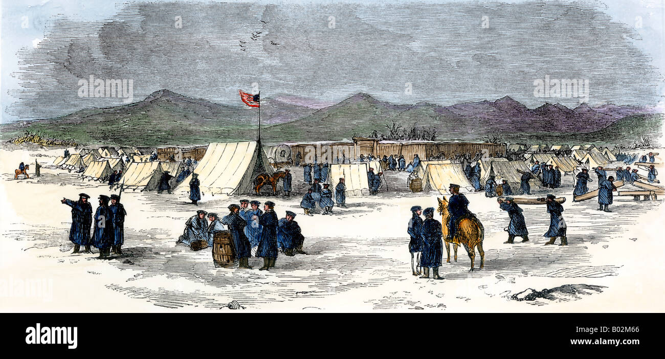 Army camp for soldiers building Fort Bridger in Wyoming 1850s. Hand-colored woodcut Stock Photo