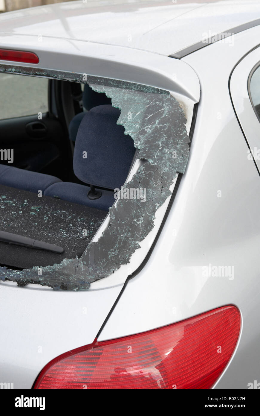 Smashed vandalised rear window of car Stock Photo Alamy
