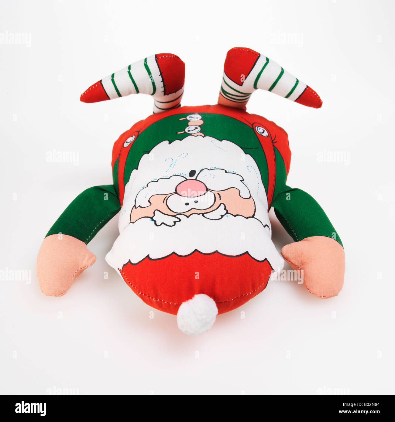 Santa Claus Christmas elf toy on white background Stock Photo - Alamy