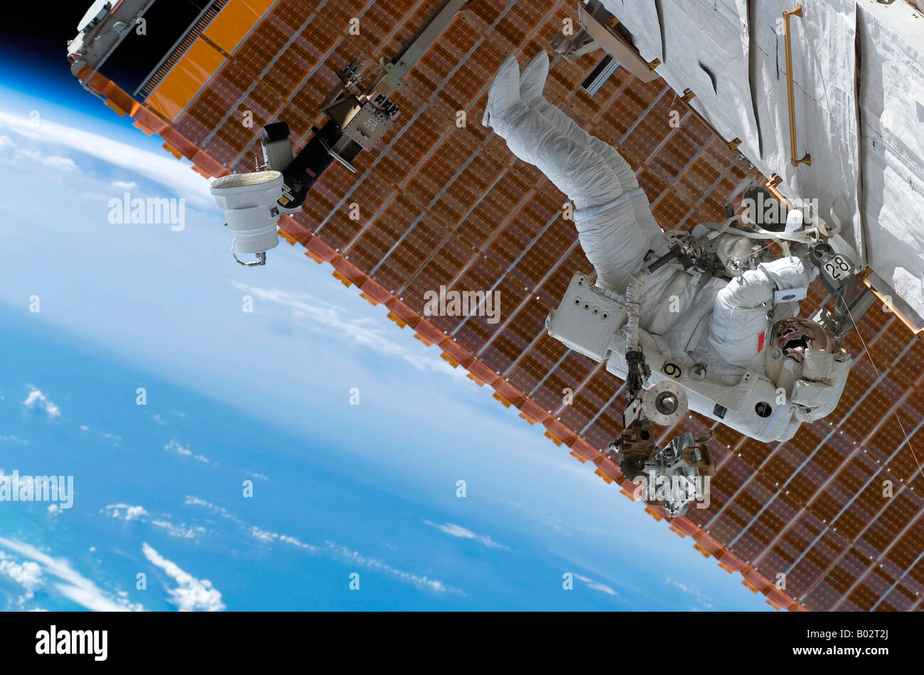 Astronaut participating in extravehicular activity. Stock Photo