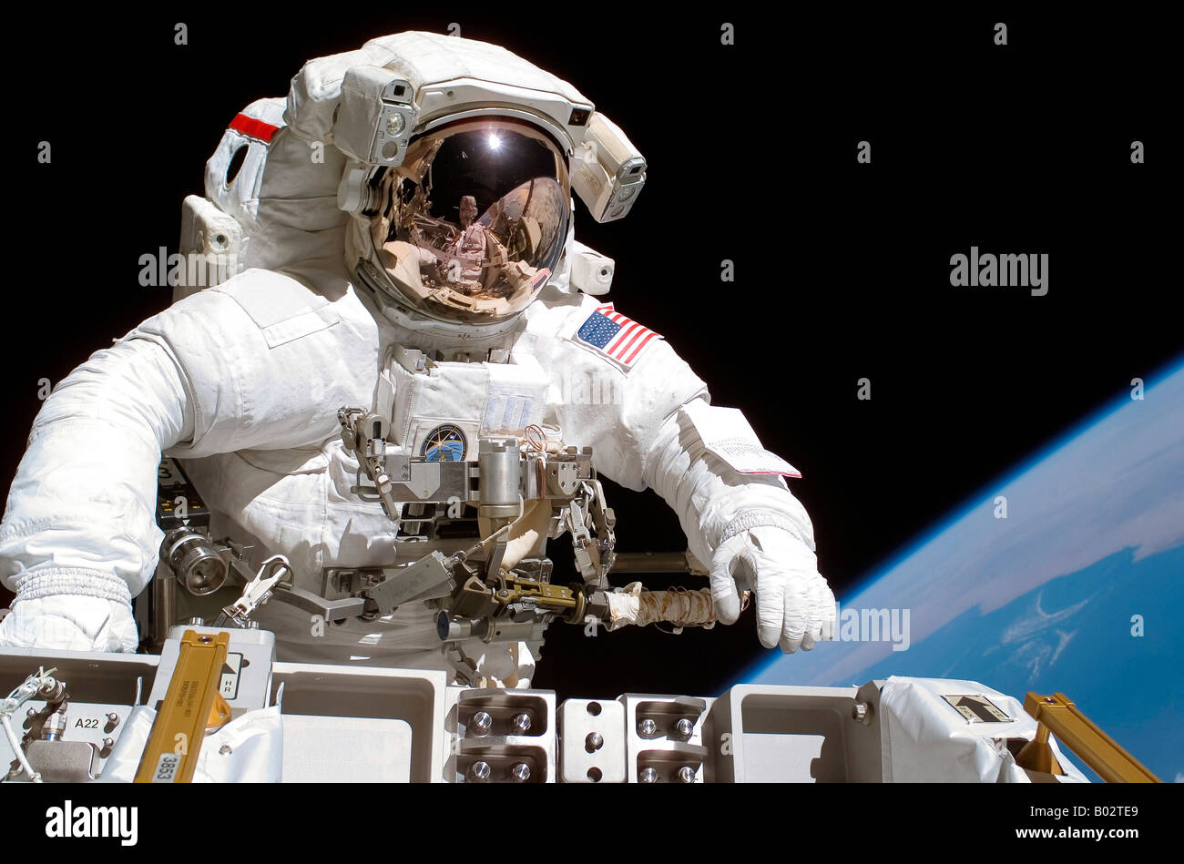 Astronaut participating in extravehicular activity. Stock Photo