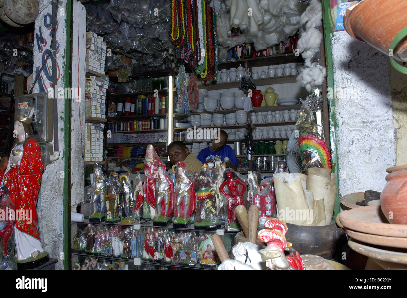 Products, artifacts of ceramic and other materials sold in the opened and stalls of Sao Joaquim market in the city of Salvador, Stock Photo