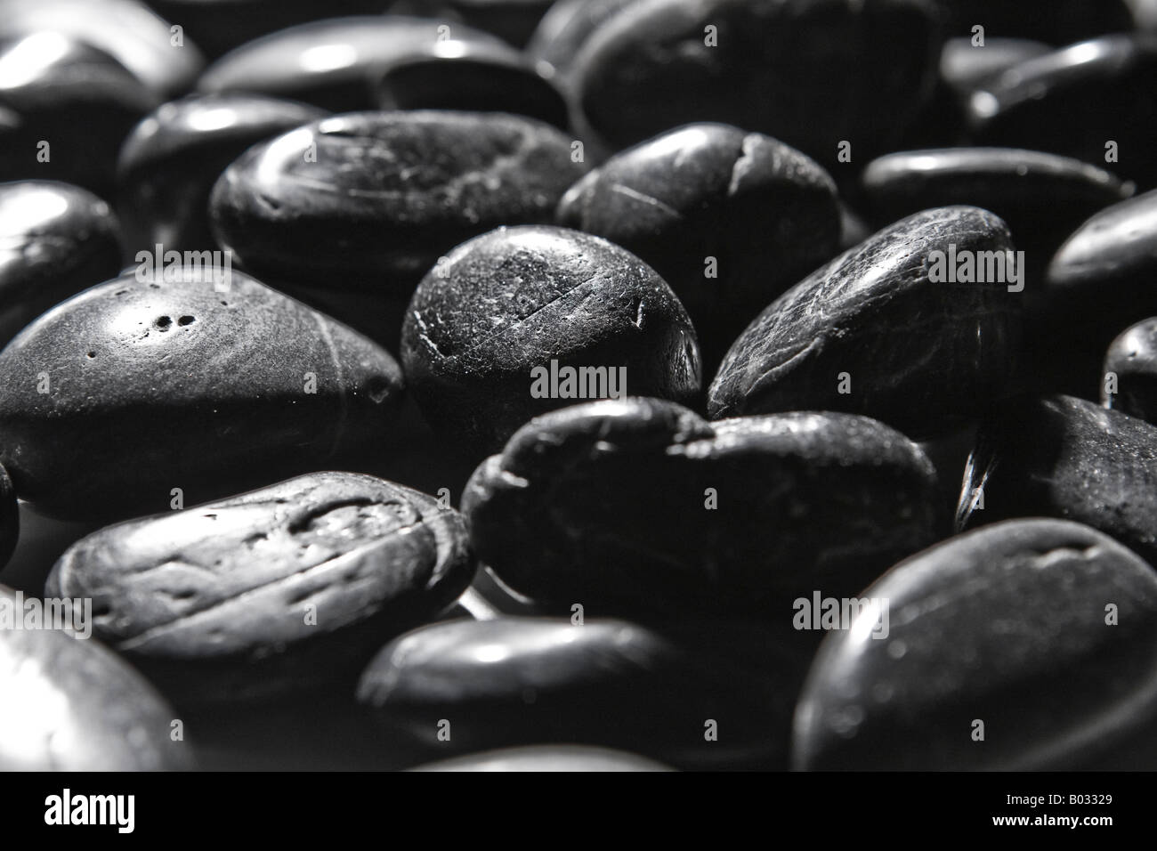 black stones river pebble close up Stock Photo - Alamy