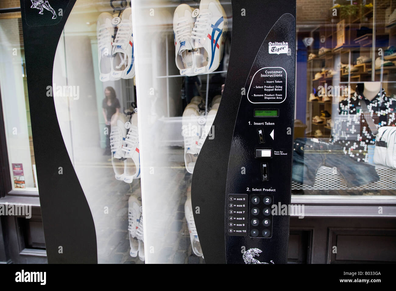 Training shoe vending machine, Soho, London, UK, close up Stock Photo