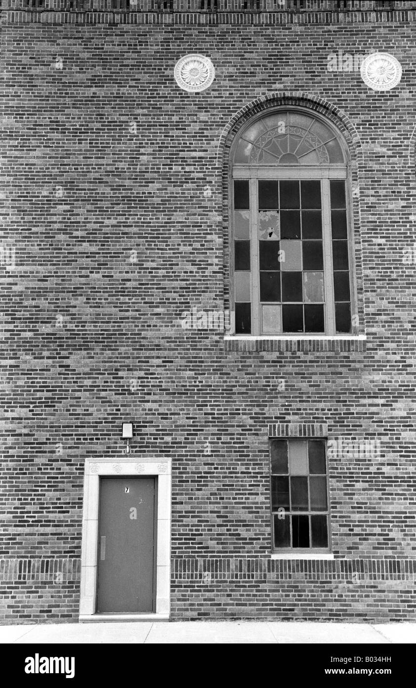 Door and brick wall with windows in Kearney, Nebraska, USA Stock Photo