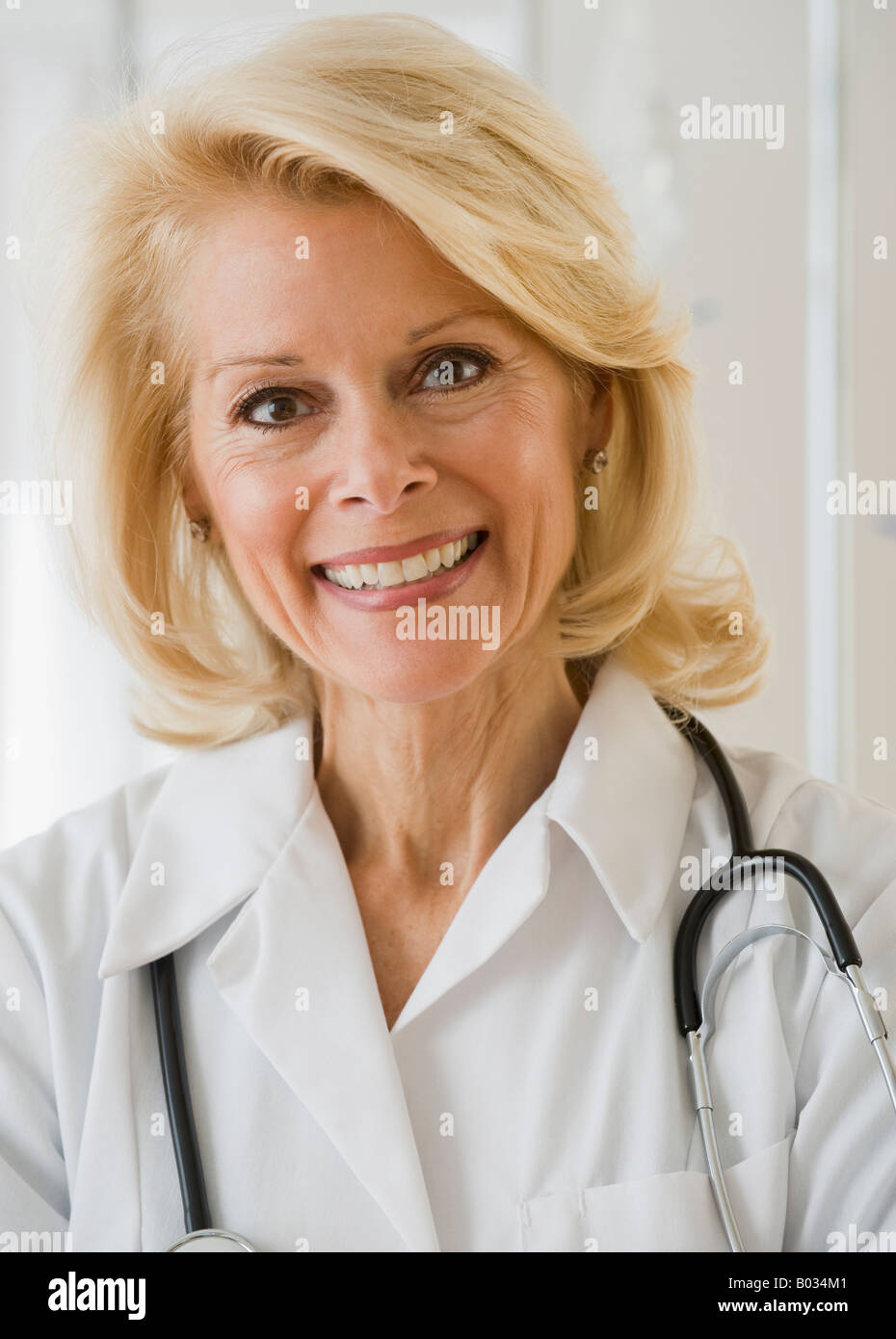 Female doctor with stethoscope around neck Stock Photo Alamy
