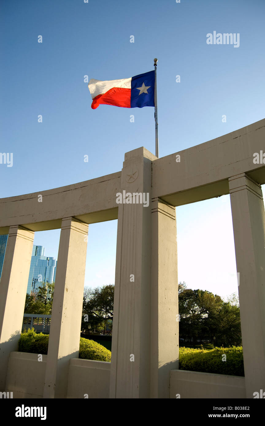 The Texas flag flys over Dealy Plaza in Dallas Texas, location of the assassination of President John F. Kennedy. Stock Photo
