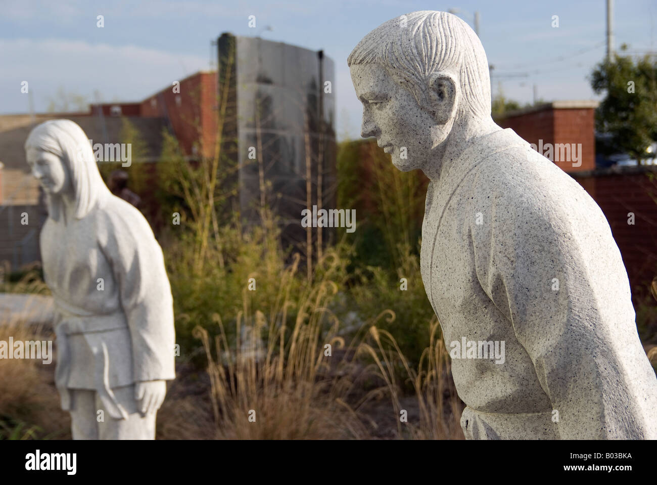 Bowing Statues at the H.U. Lee International Gate & Garden Memorial in Little Rock Arkansas. Stock Photo