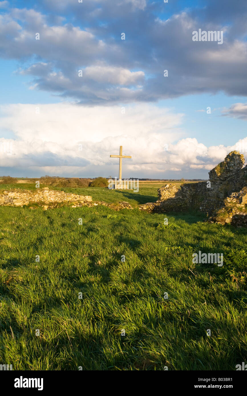 Cross and remains of the former site of St Benets Abbey on the Norfolk Broads Stock Photo