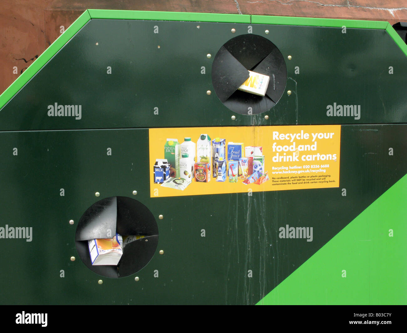 UK Cardboard juice bottles recycling bins in a Tesco supermarketHackney