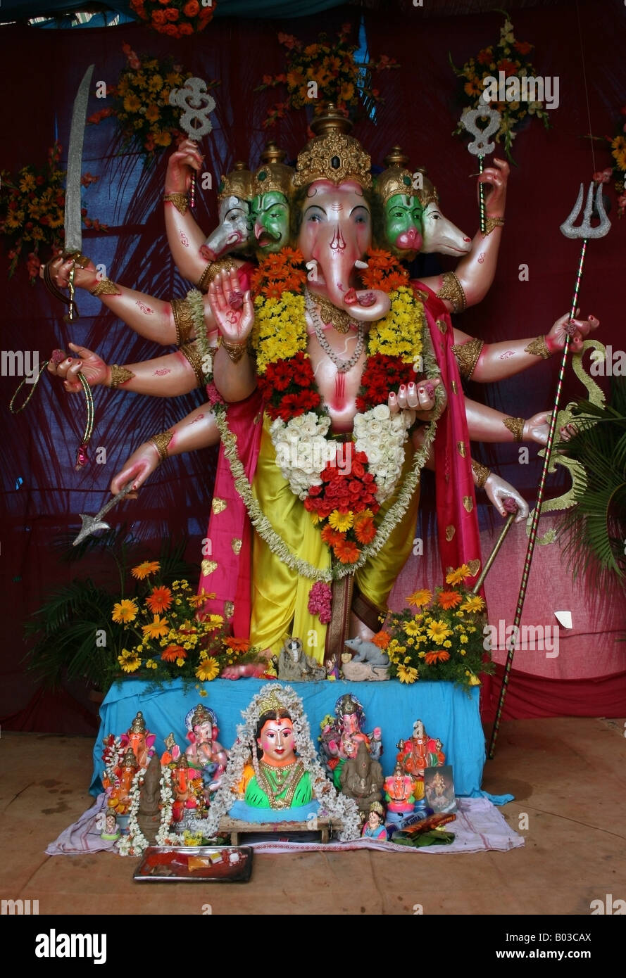 Five headed eight armed Ganesh and Gauri statue with pooja ...