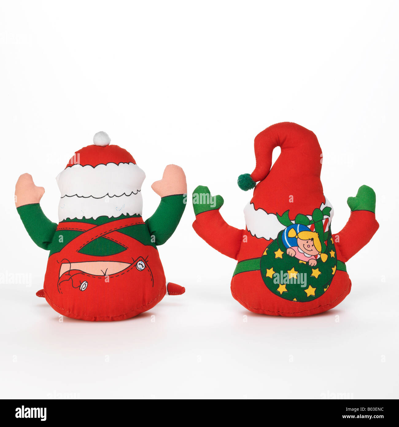Santa Claus Christmas elf toys on white background Stock Photo - Alamy