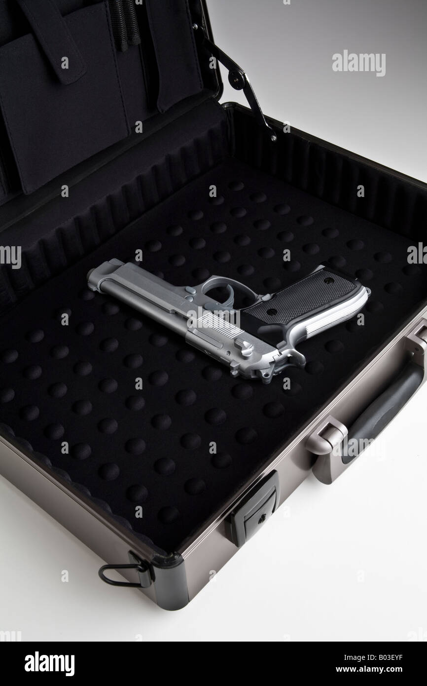 gun in a briefcase Stock Photo Alamy