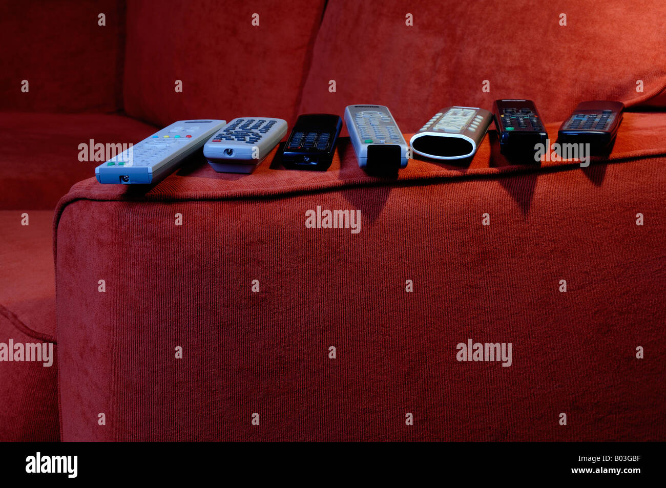 Sofa and remote controls Stock Photo