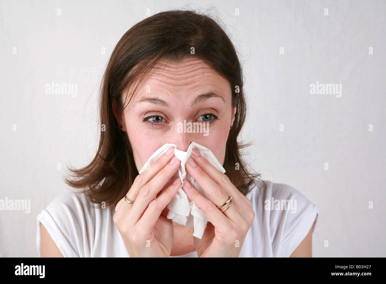 Woman sneezes hi-res stock photography and images - Page 8 - Alamy