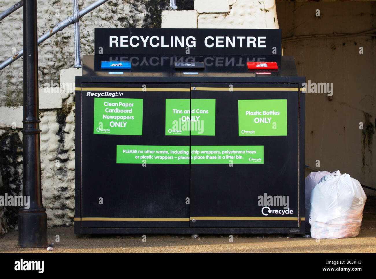Public Recycling Centre Bank / Bin for plastic bottles, Tin Cans, Paper, cardboard & newspapers on the Norfolk Coast at Cromer Stock Photo