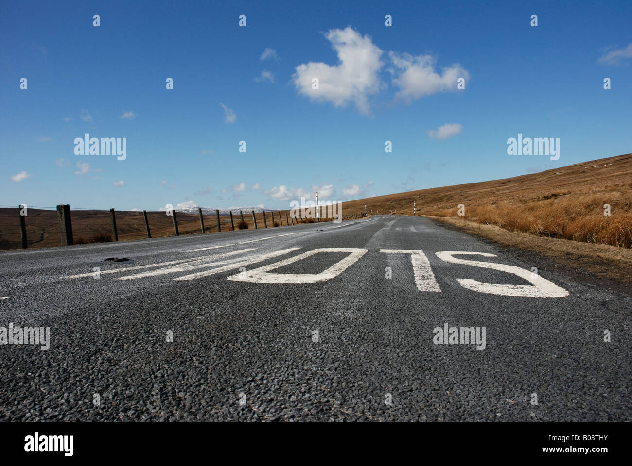 Slow road marking hi-res stock photography and images - Alamy