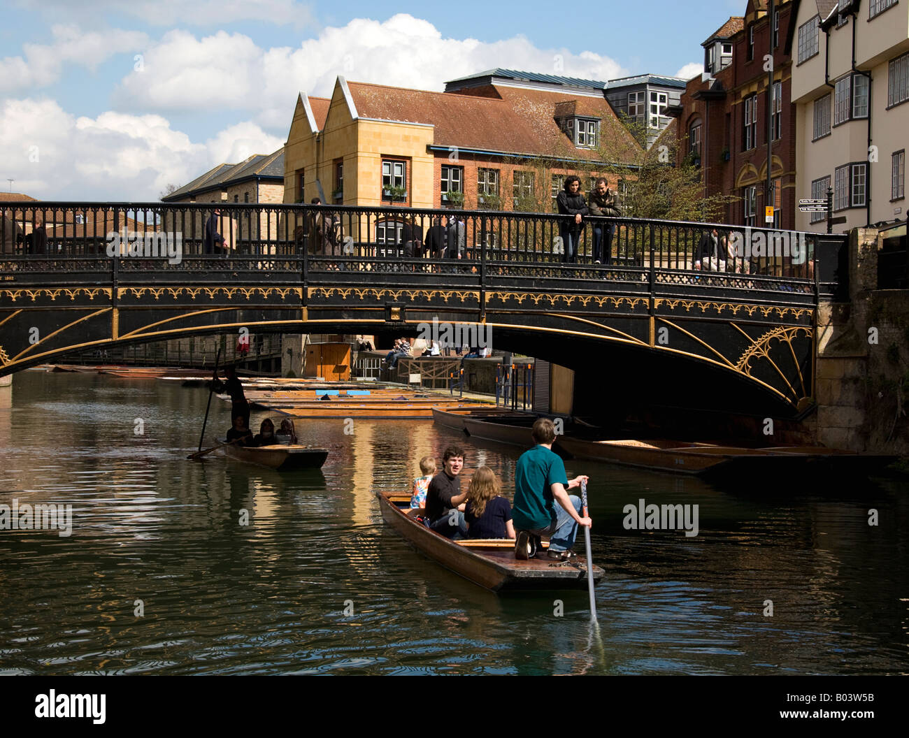 two punts on the river Cam moving in opposite directions under Magdalene Bridge. Stock Photo