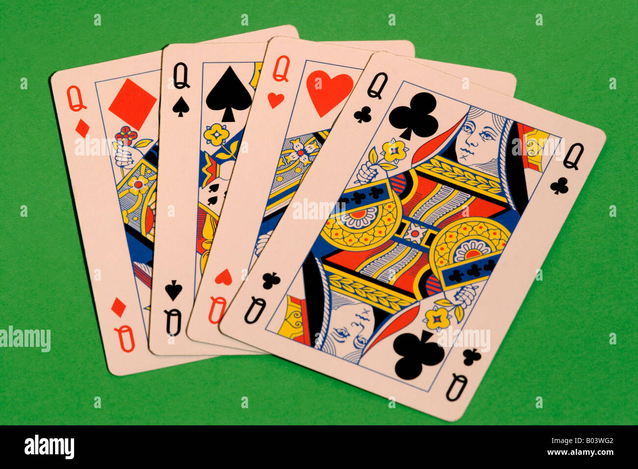Playing cards four queens close up Stock Photo Alamy