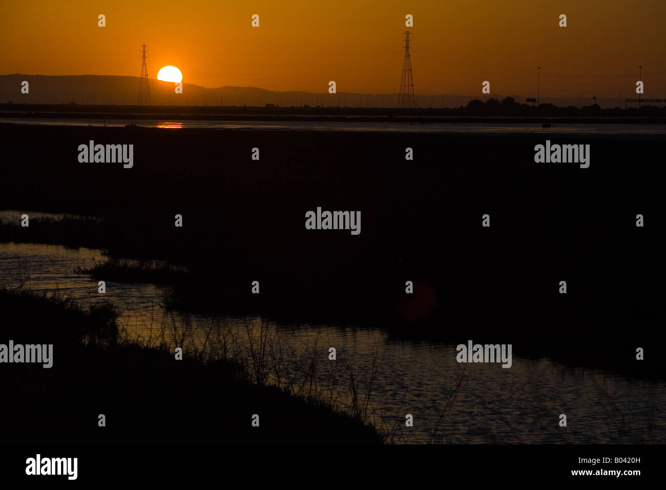sunset at Eden Landing wetland area, Hayward, California Stock Photo