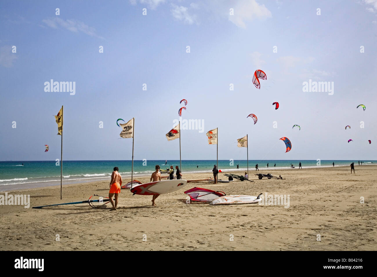 Beach La Barca with many flags, Playa Sotavento, Jandia, Fuerteventura, Canaries, Spain Stock Photo