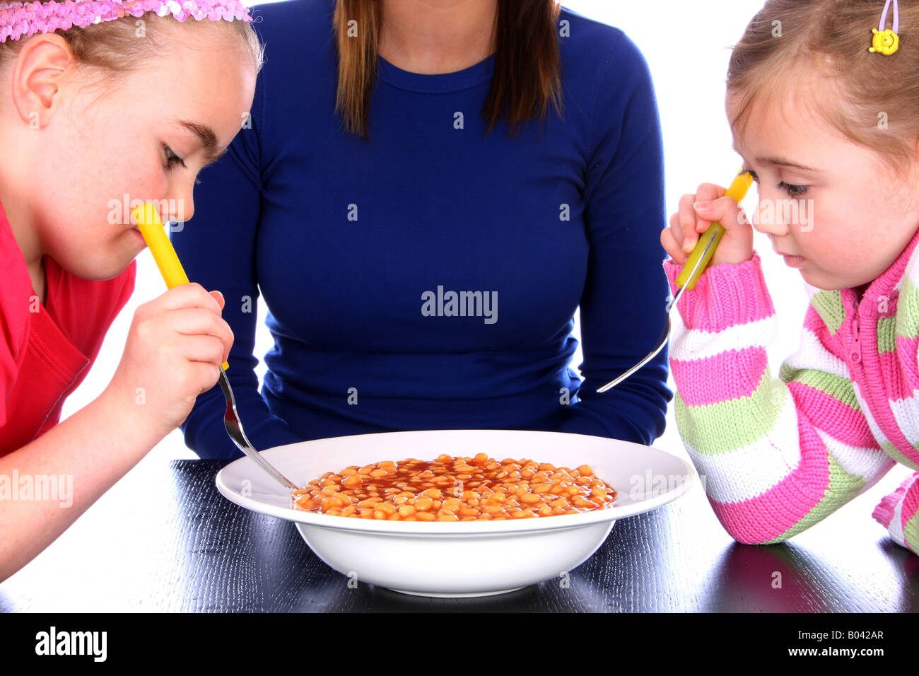 Girl eating baked beans hires stock photography and images Alamy
