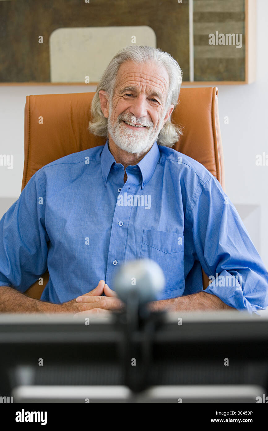 Senior man using webcam Stock Photo - Alamy