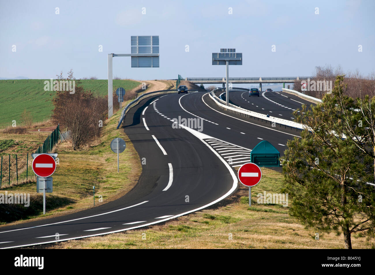 No entry / stop signs to French autoroute motorway - warning to drive on right right hand side when driving in France / Europe Stock Photo