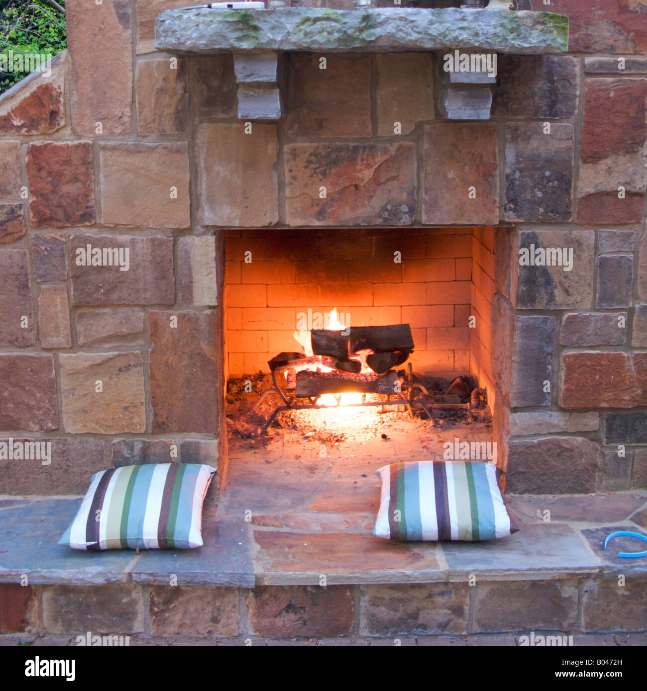 Outdoor fireplace in suburban home Stock Photo Alamy