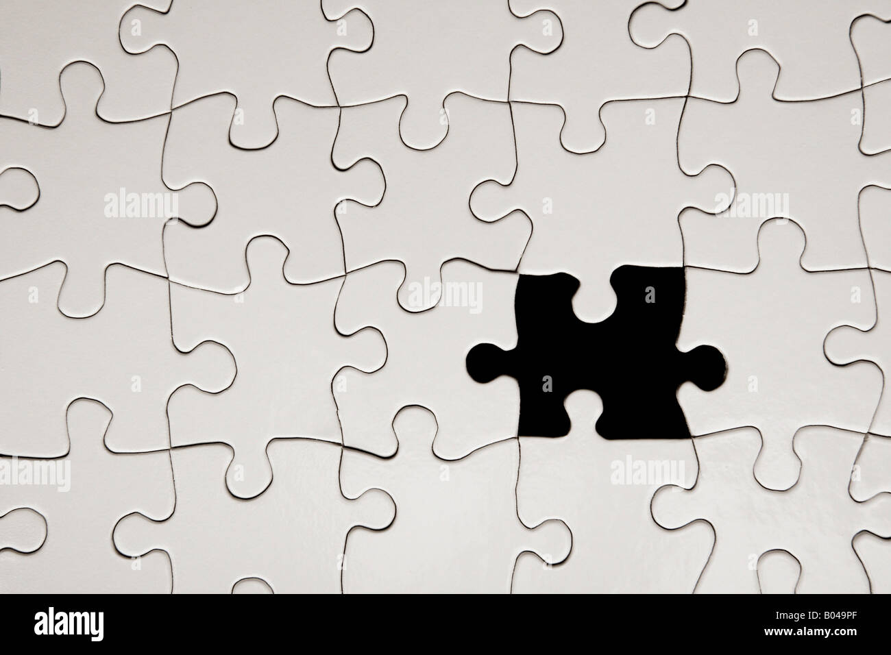 Jigsaw puzzle with missing piece. Missing puzzle pieces Stock Photo