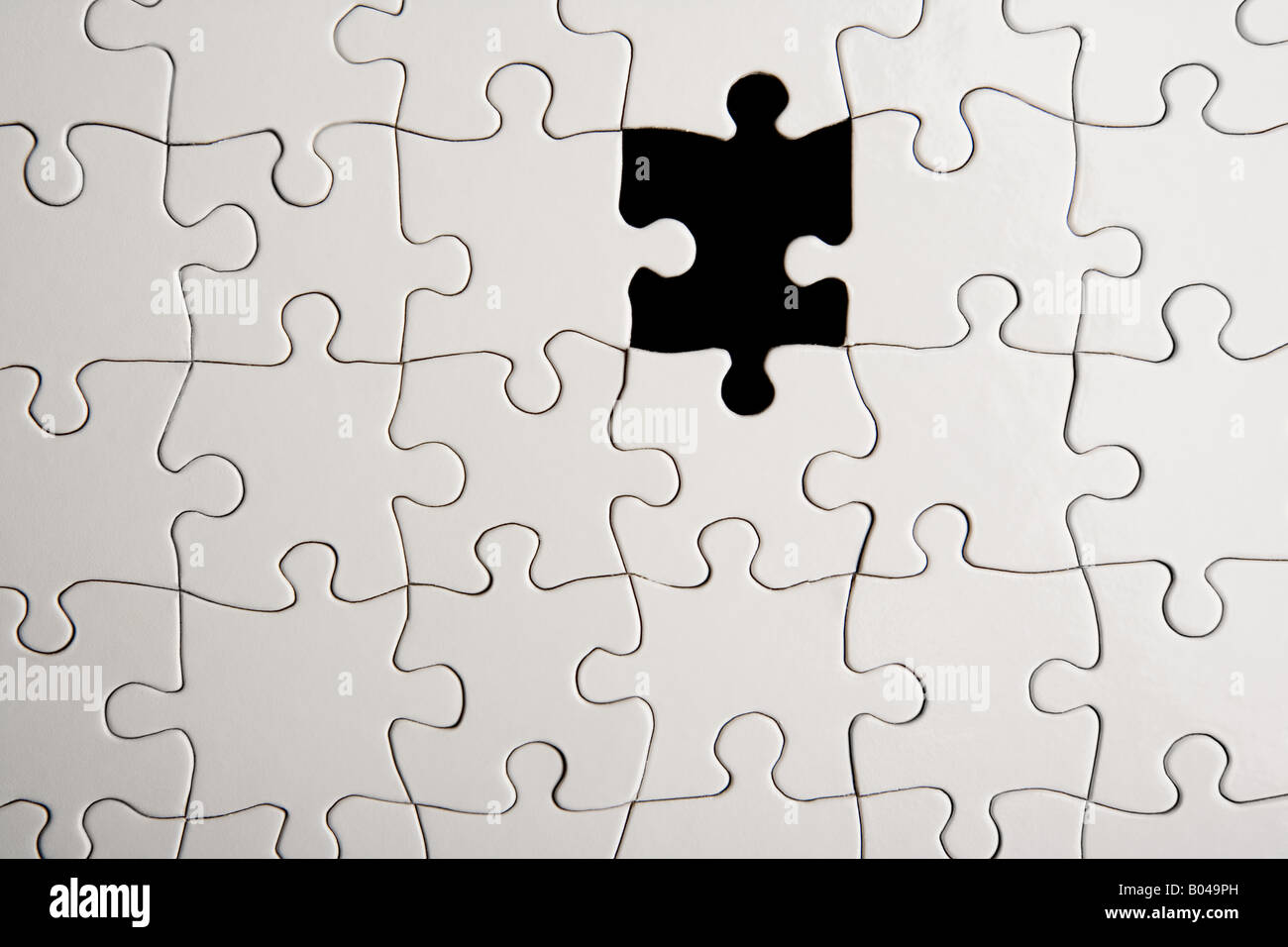 Jigsaw puzzle with missing piece. Missing puzzle pieces Stock Photo