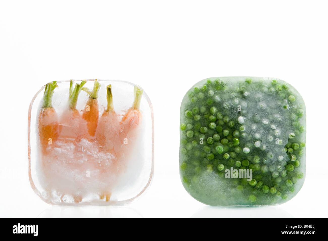 Frozen carrots and peas Stock Photo Alamy