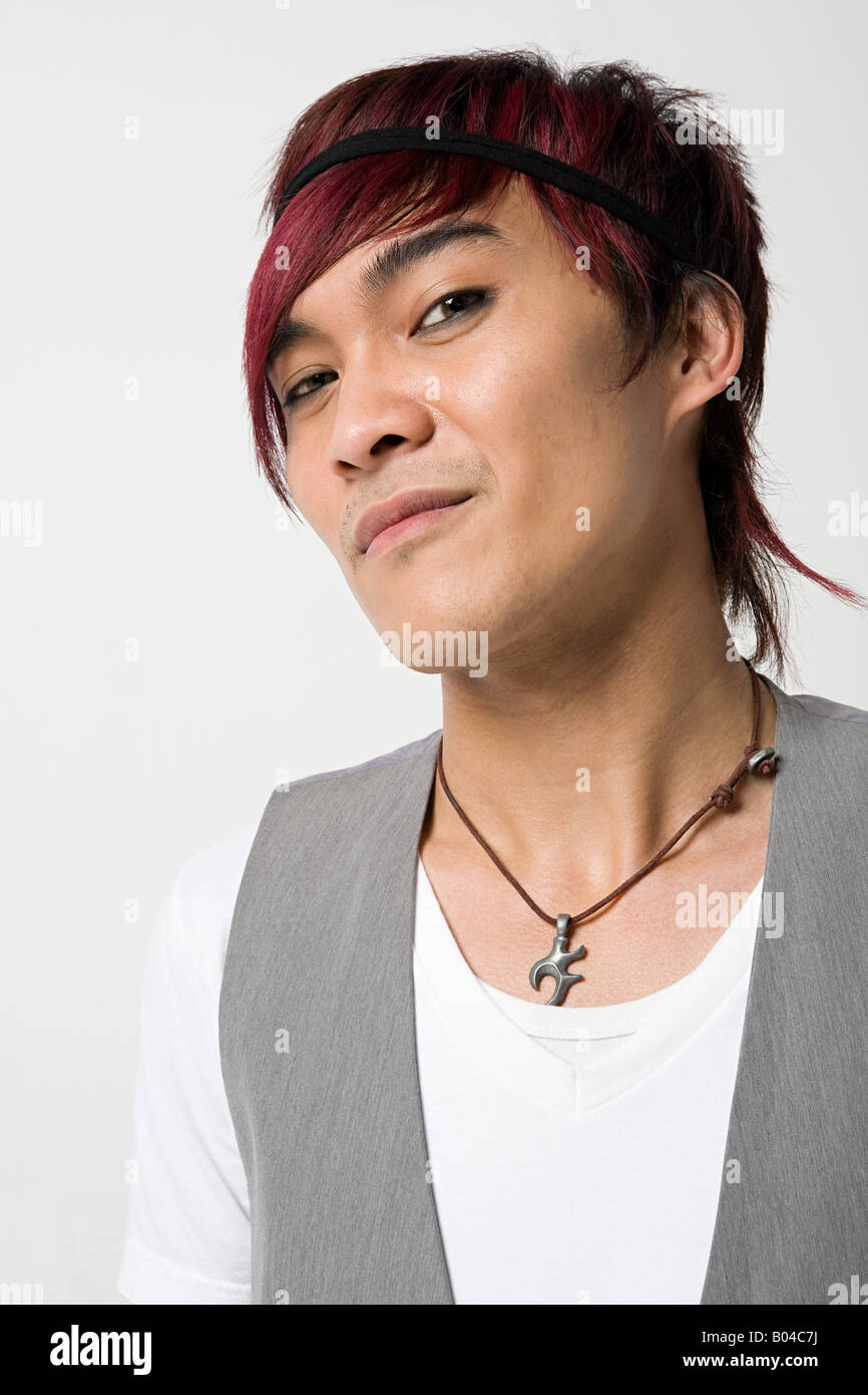Smug looking japanese man Stock Photo
