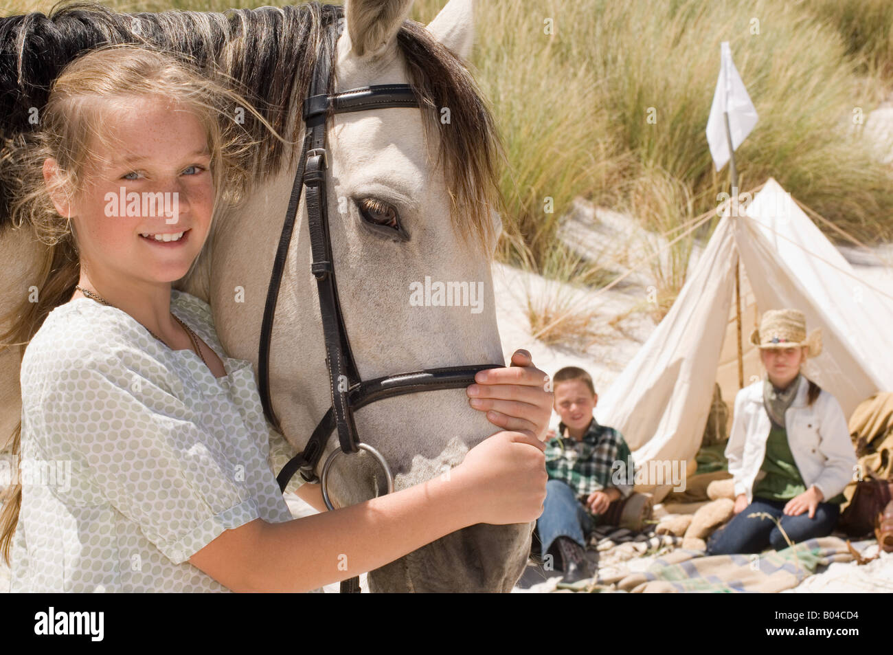 A girl with a horse Stock Photo