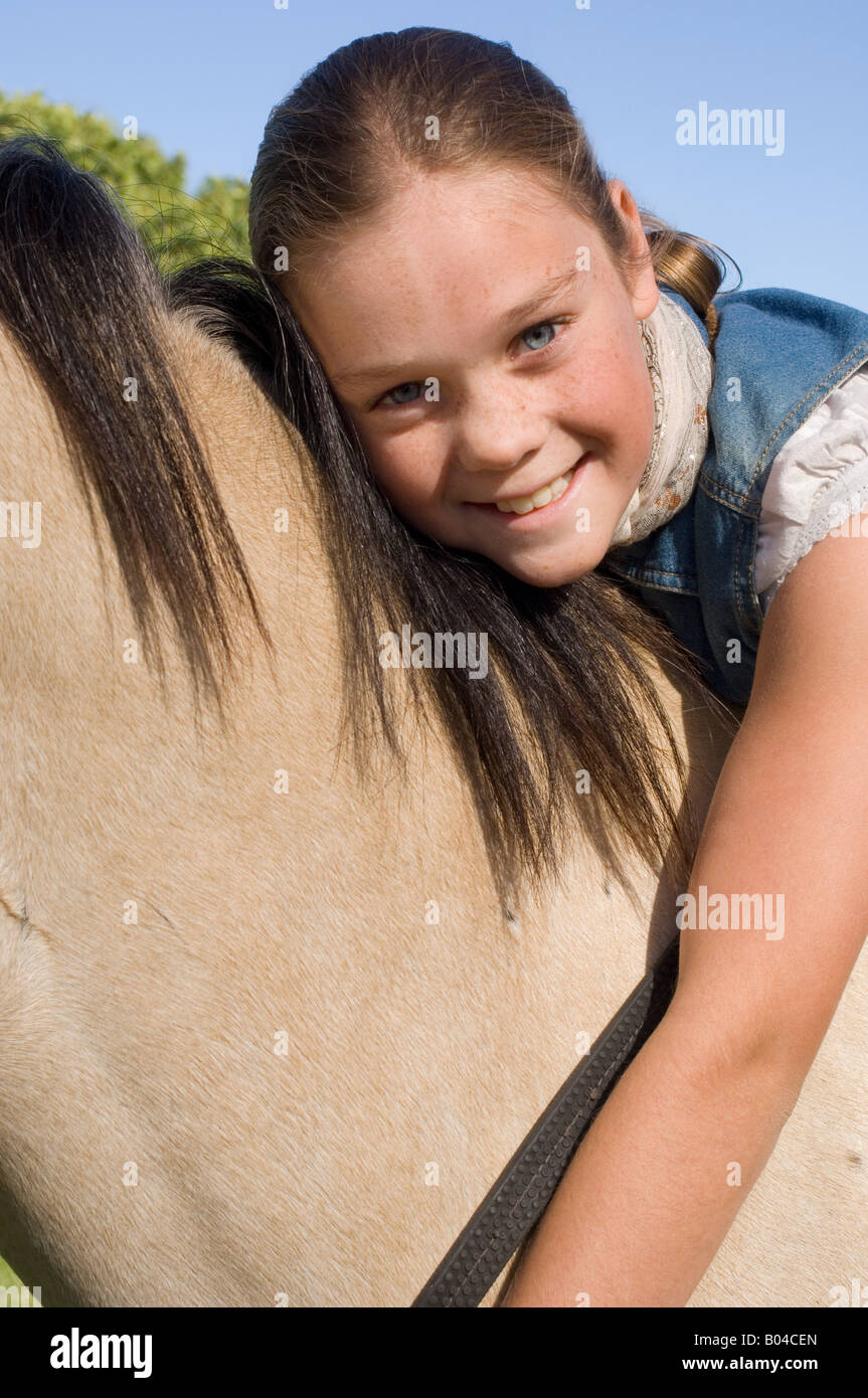 Portrait of a girl on a horse Stock Photo