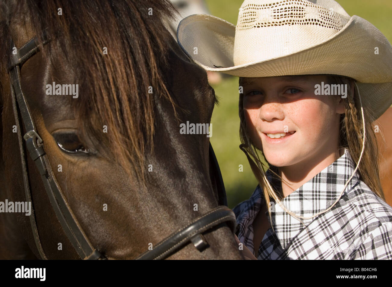 Portrait of a girl and a horse Stock Photo