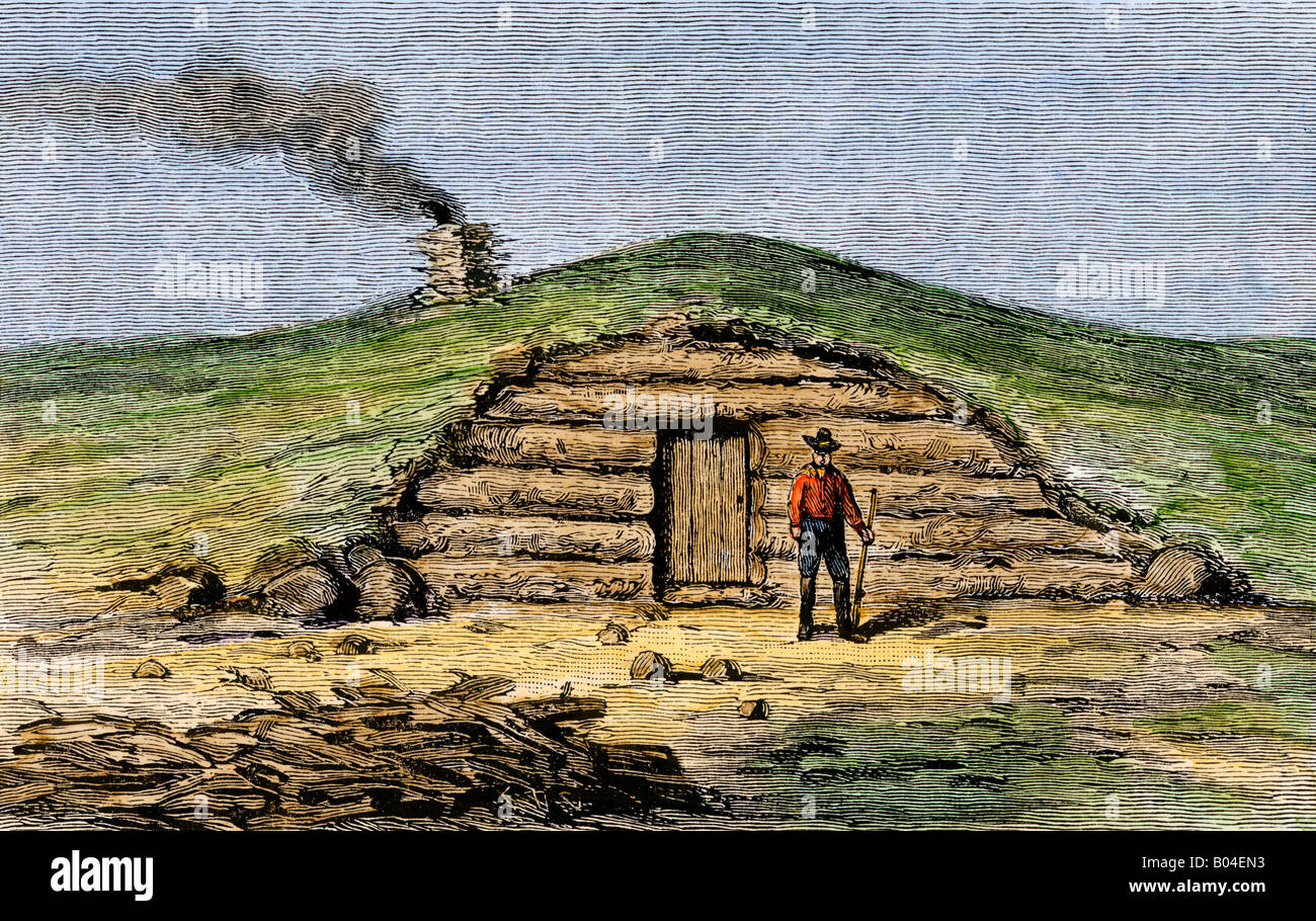 A Dugout Home Covered With Sod For A Prairie Homesteader 1800s Stock a-dugout-home-covered-with-sod-for-a-prairie-homesteader-1800s-stock