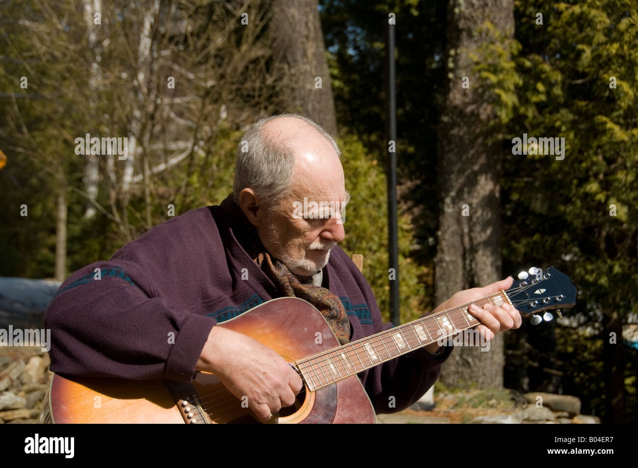 senior playing acoustic guitar Stock Photo Alamy