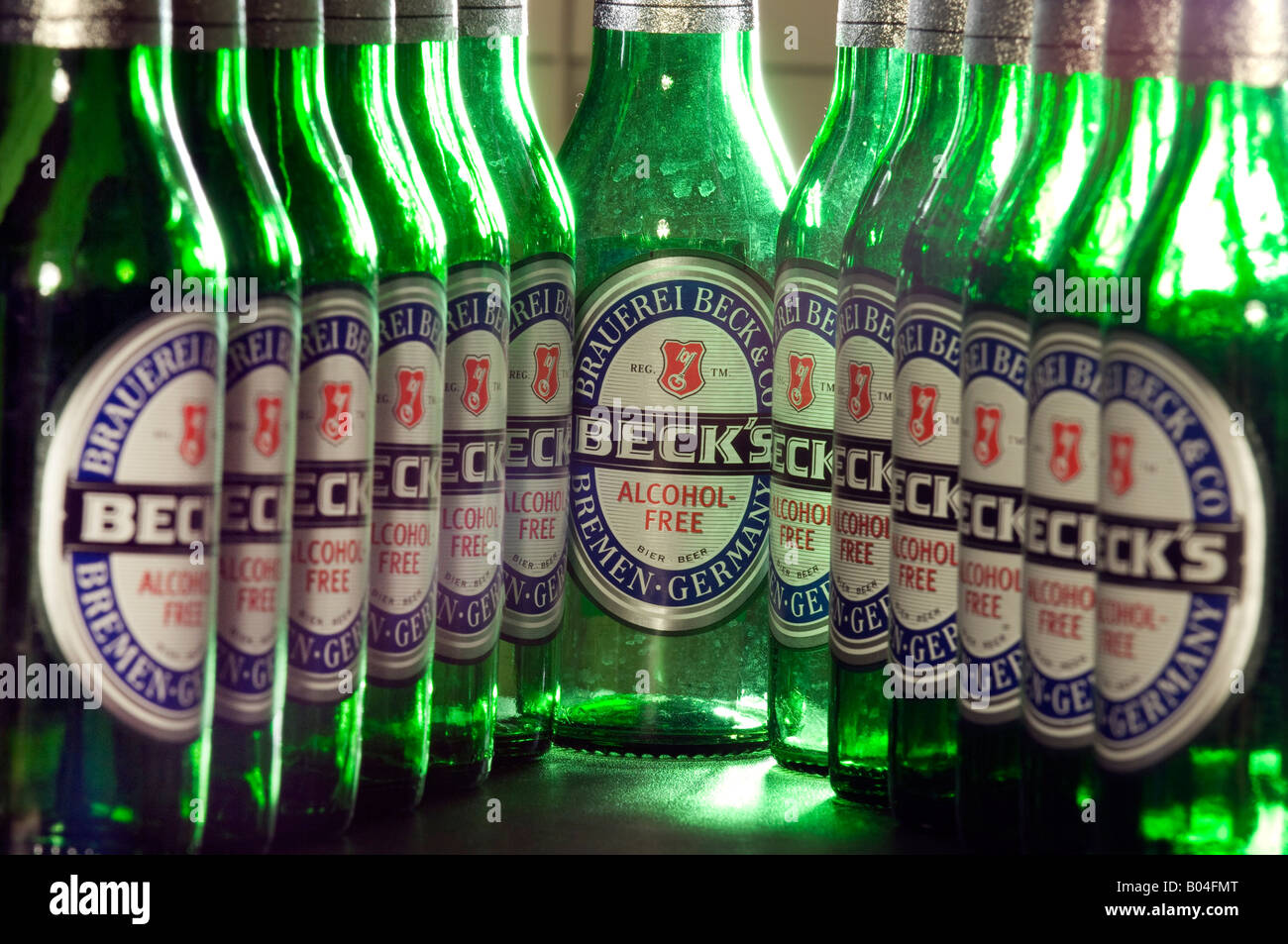 Rows of Becks alcohol free or low alcohol beer in green glass bottles