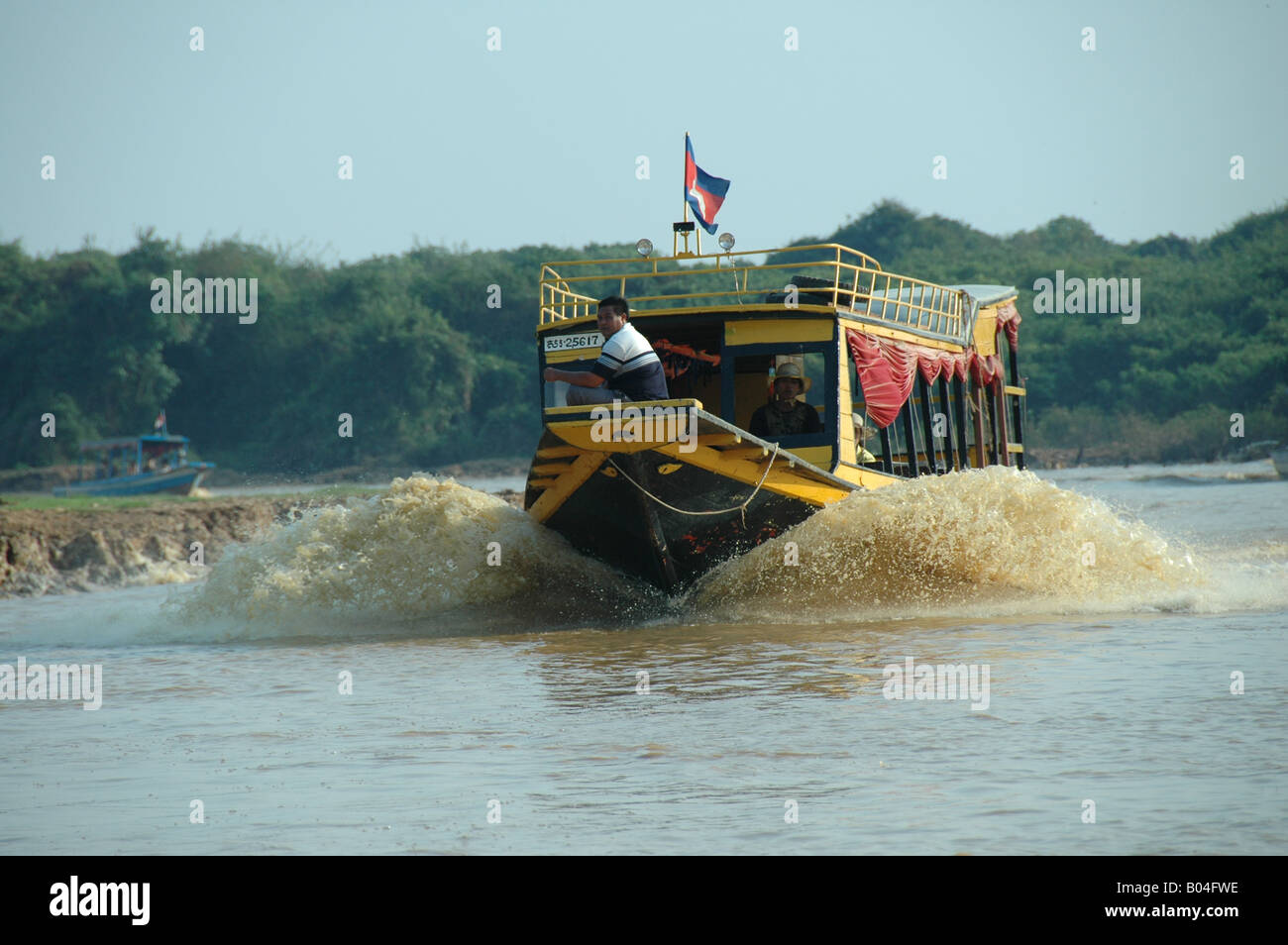 Fast tourist boat on Tonlé Sap Lake, near Siem Reep, Cambodia. Stock Photo