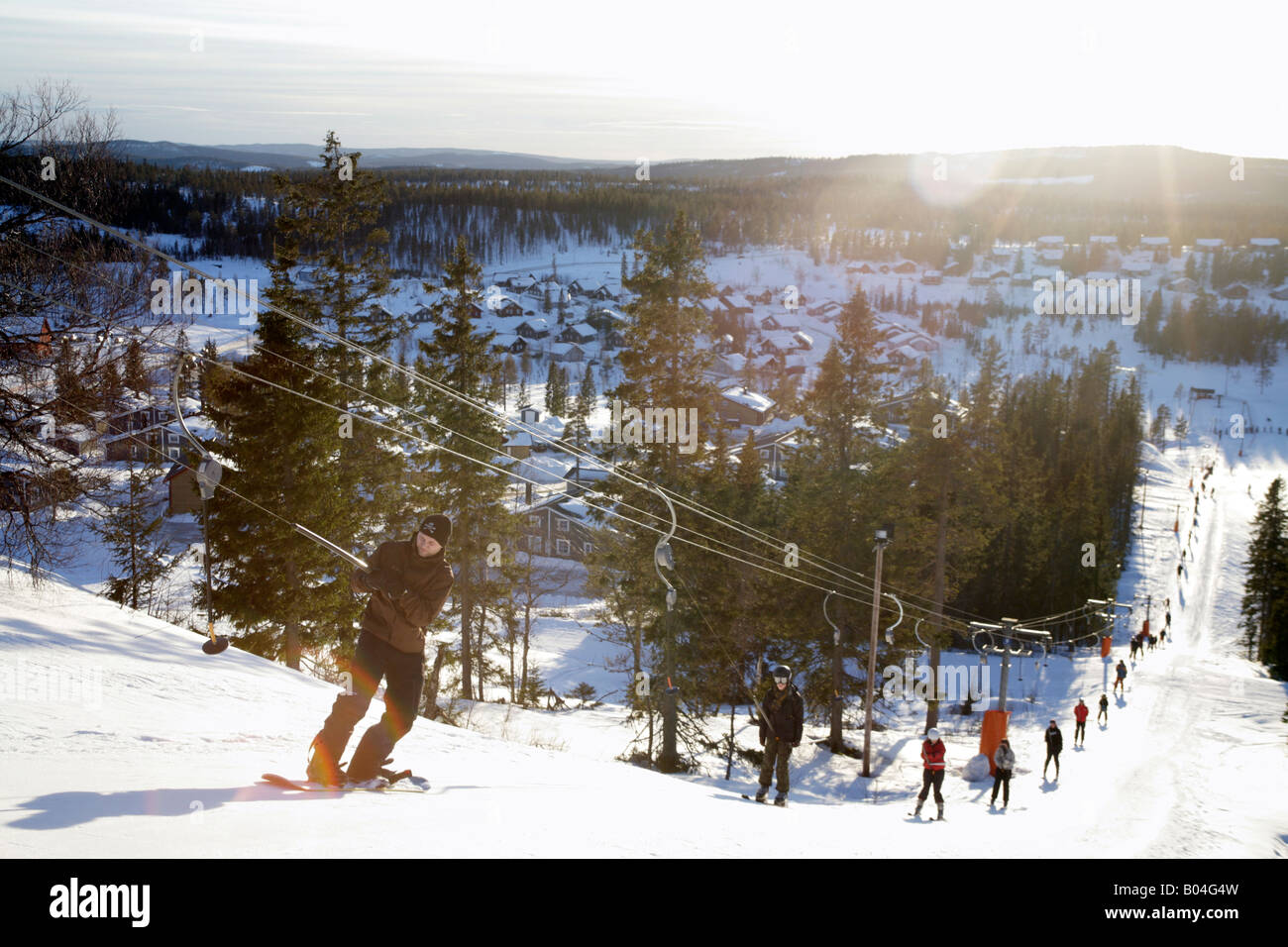Young people riding a ski lift on a sunny day at ski resort.Branas Ski  Resort Sweden Stock Photo - Alamy