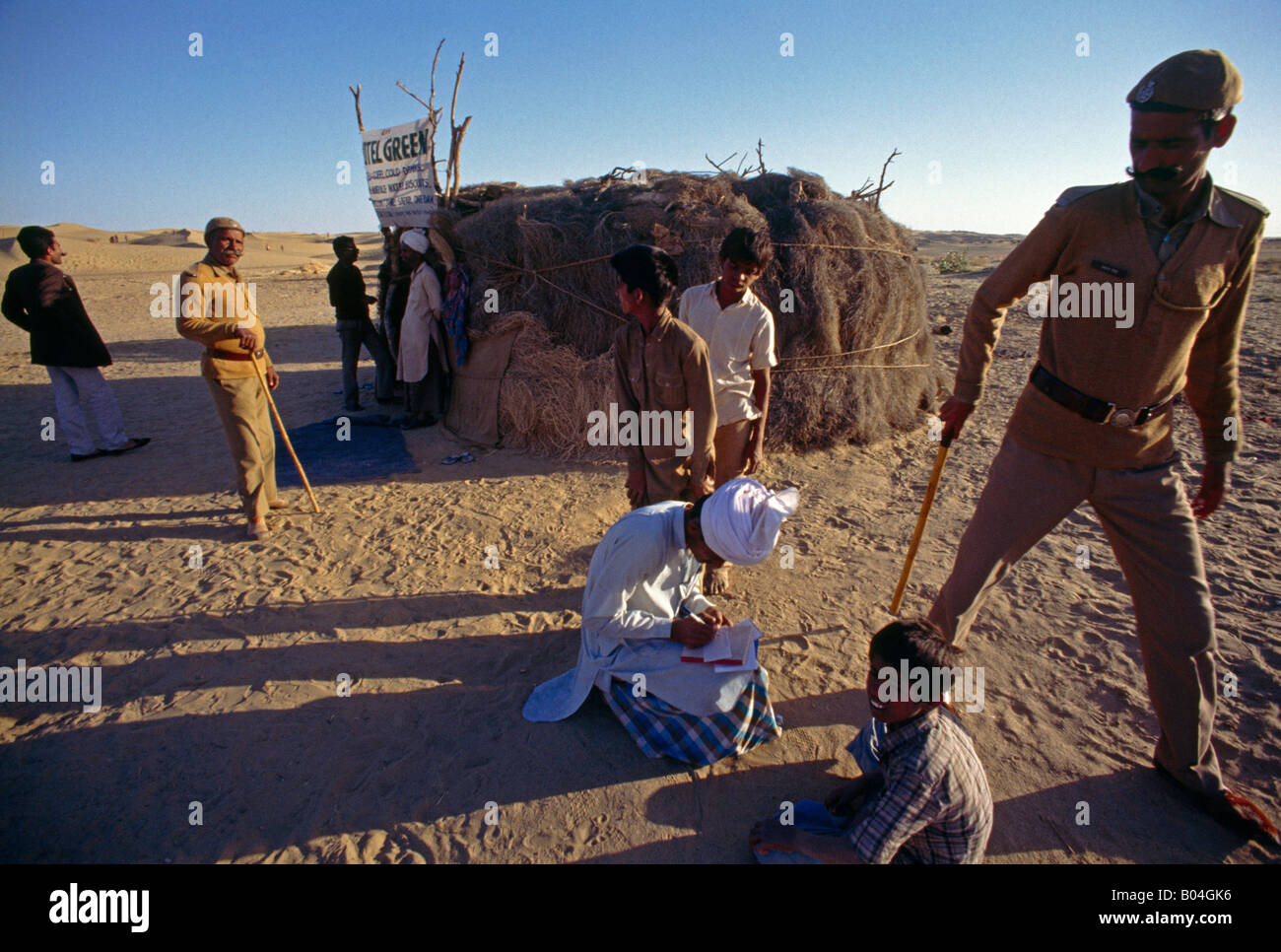 Thar Desert India Hotel Green Soldier With Lathi Stick & People Stock Photo