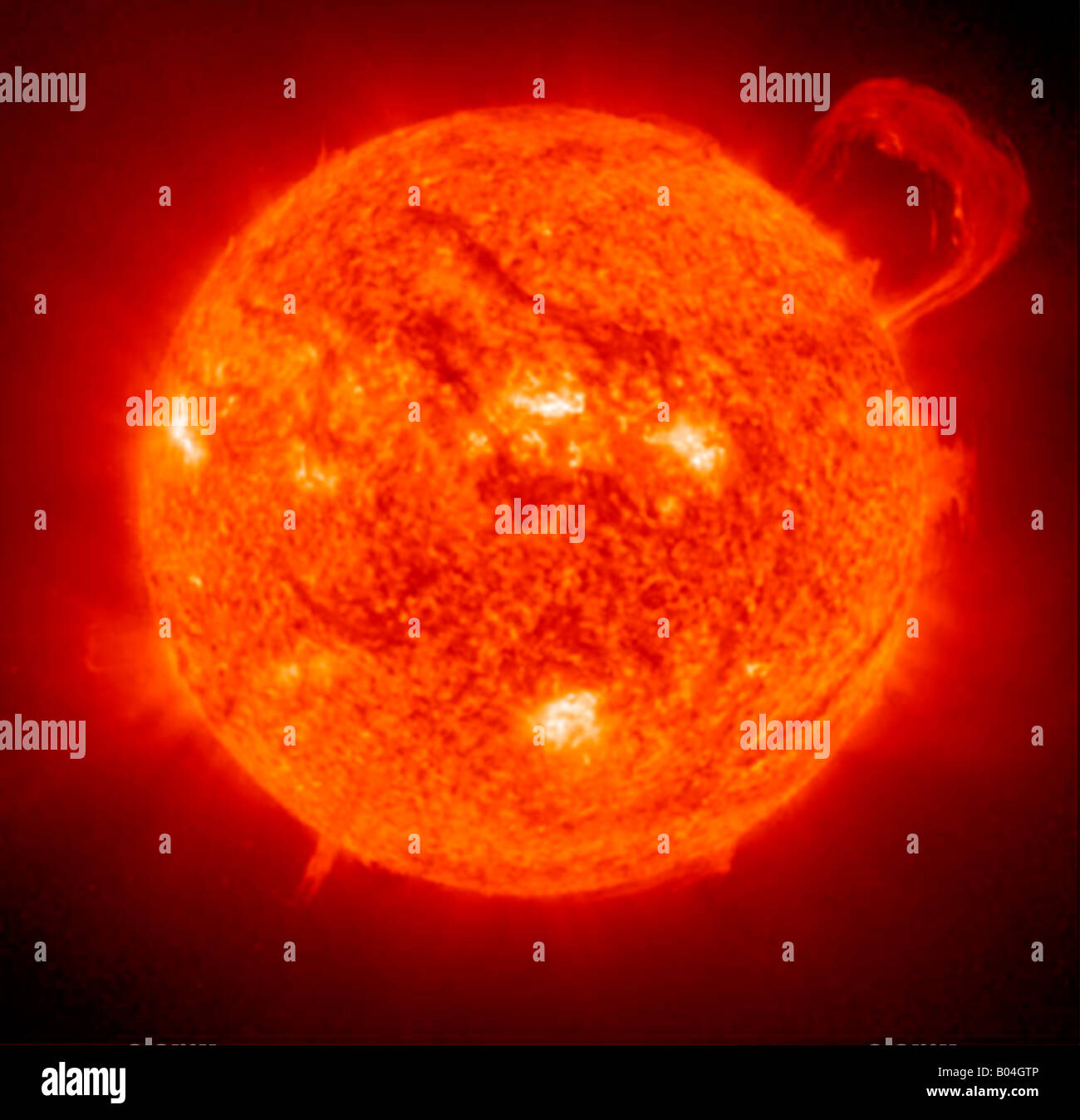 digitally altered photo of the sun showing flares and explosions Hubble NASA Stock Photo