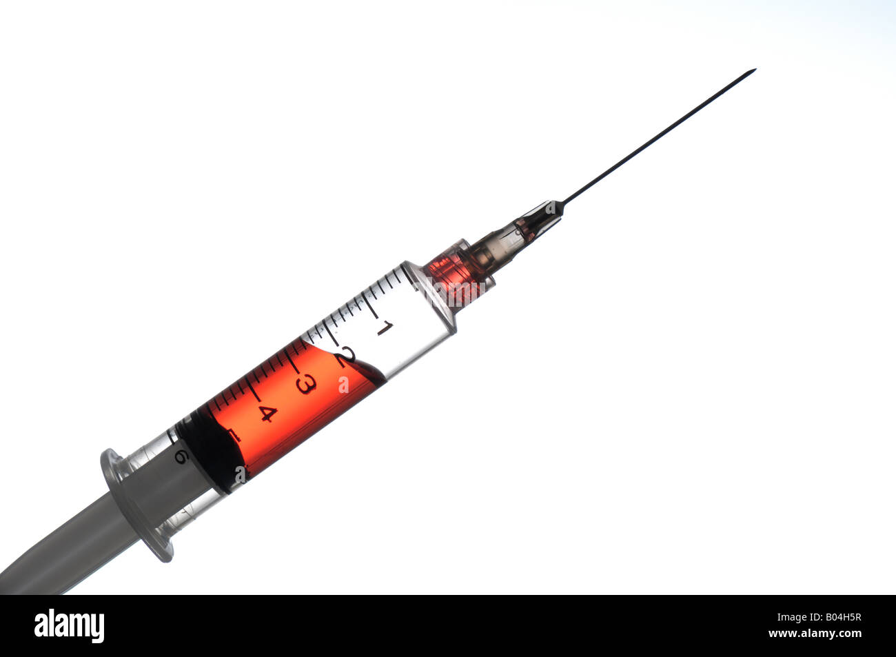 closeup hypodermic needle with red fluid Stock Photo Alamy