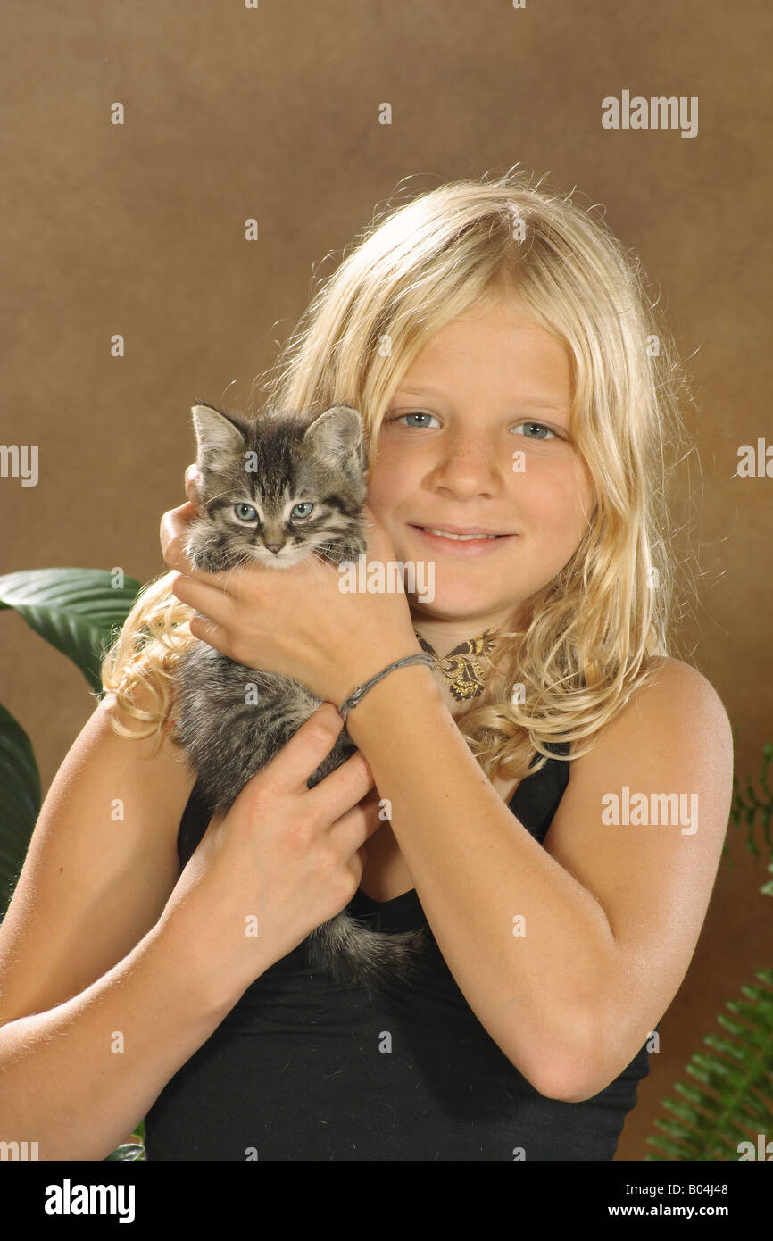 Girl With Kitten Stock Photo - Alamy