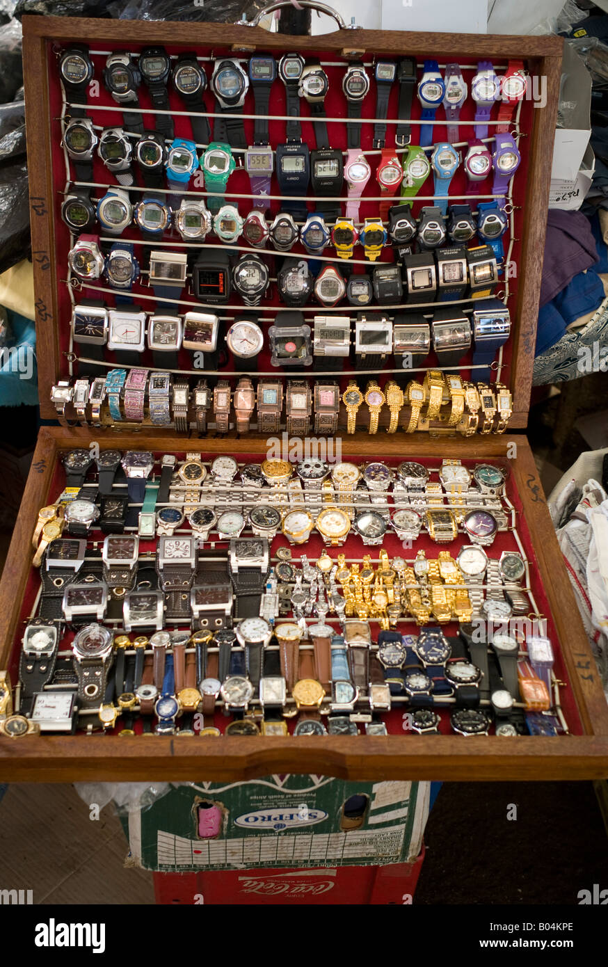 Watches on display by street trader, Port Louis market, Mauritius Stock