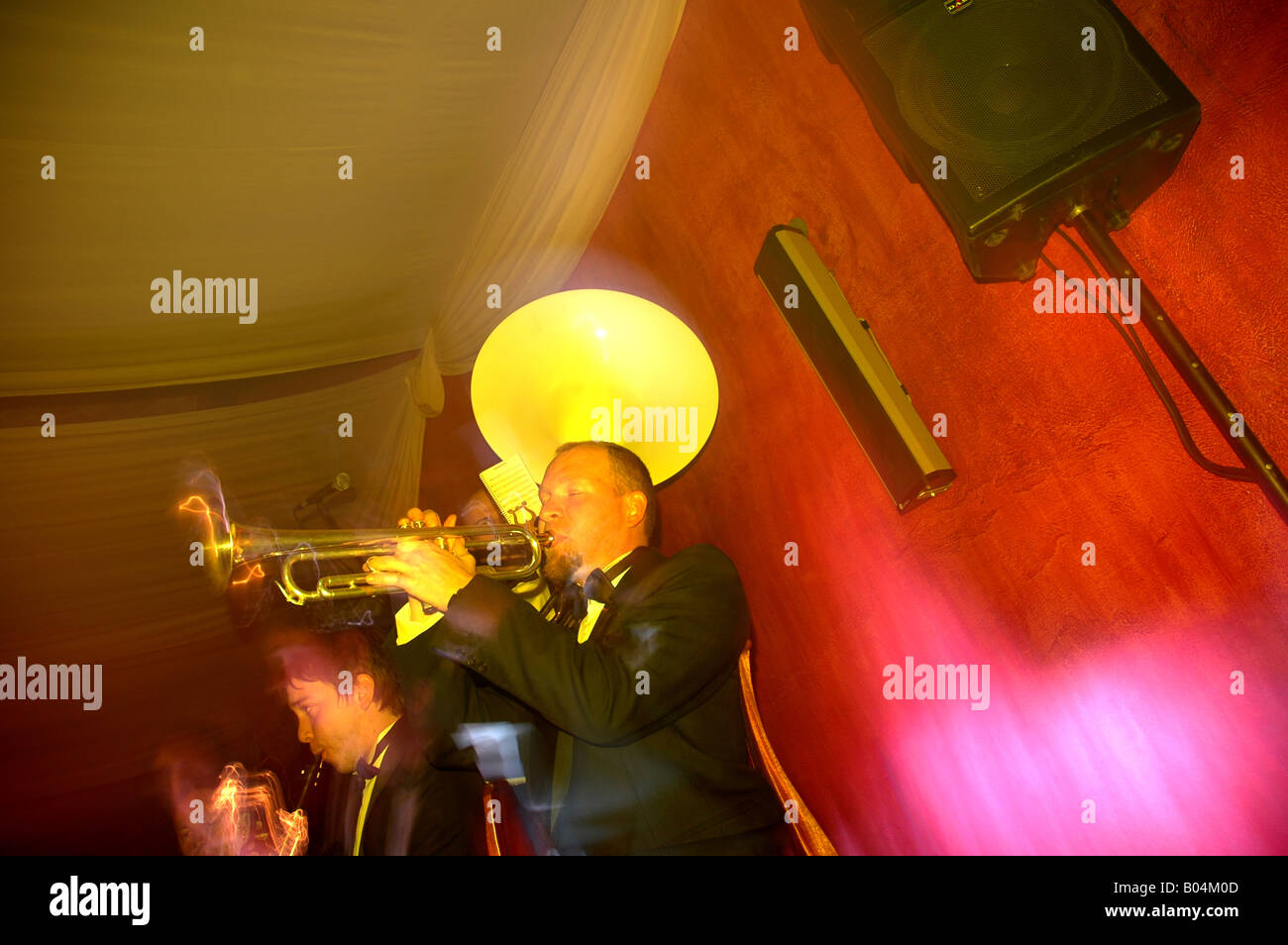 Feier party celebration Farbblitz colorflash Bewegungsunschärfe blurred motion Bühne stage arena Musiker musician Stock Photo