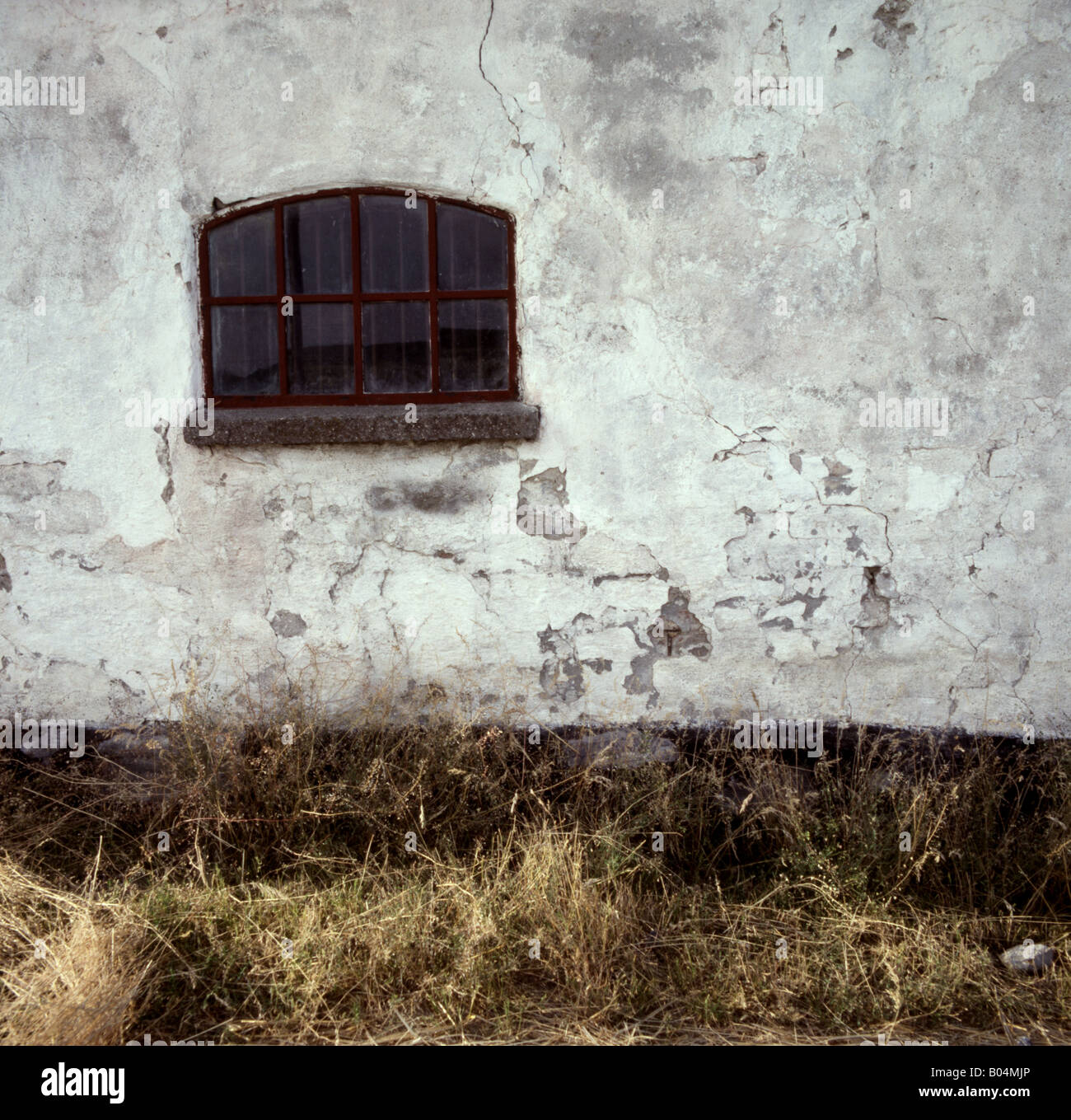 Stone wall with window Stock Photo - Alamy