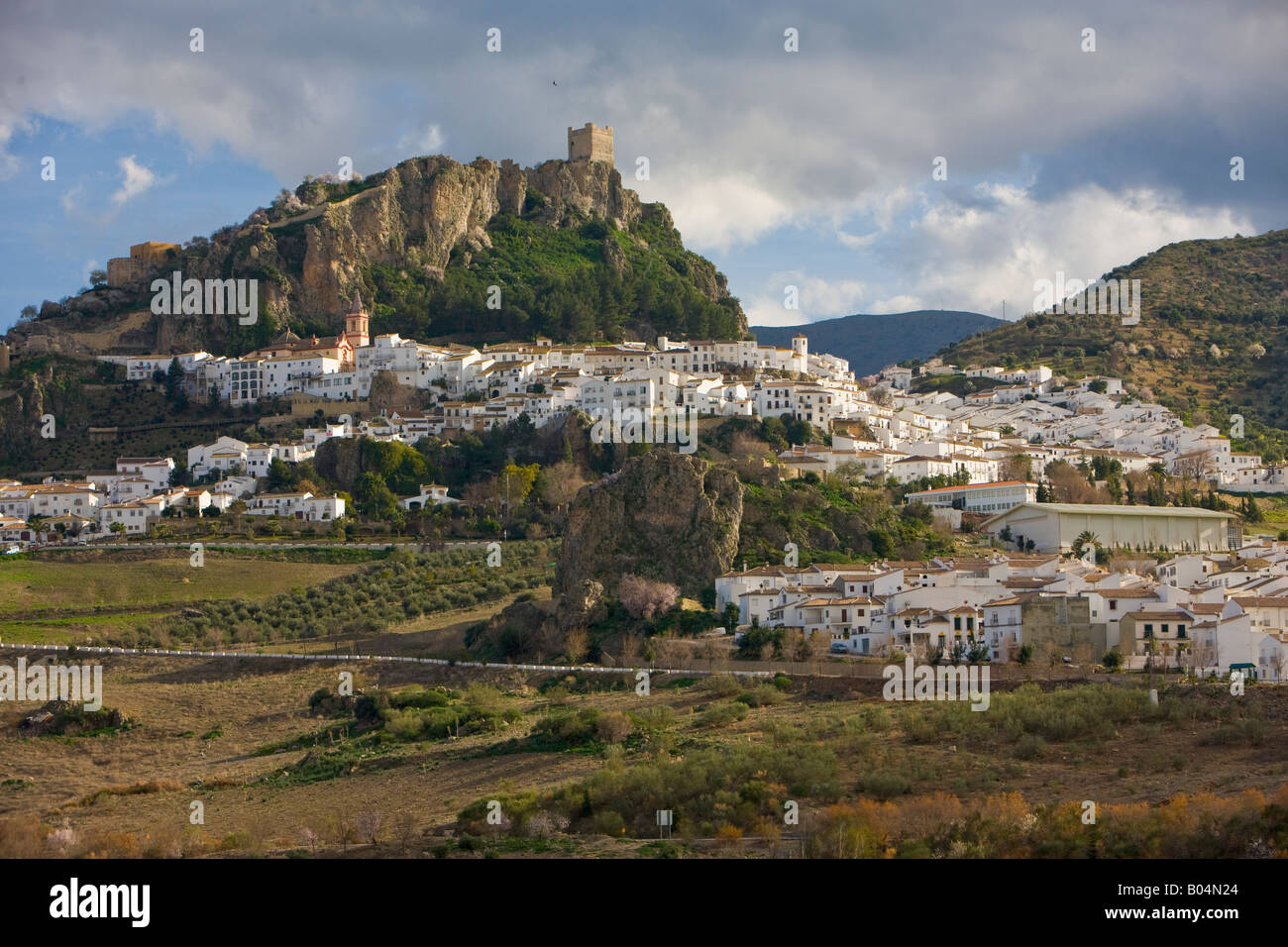 White town (Pueblos Blancos) of Zahara de la Sierra fanning out below ...
