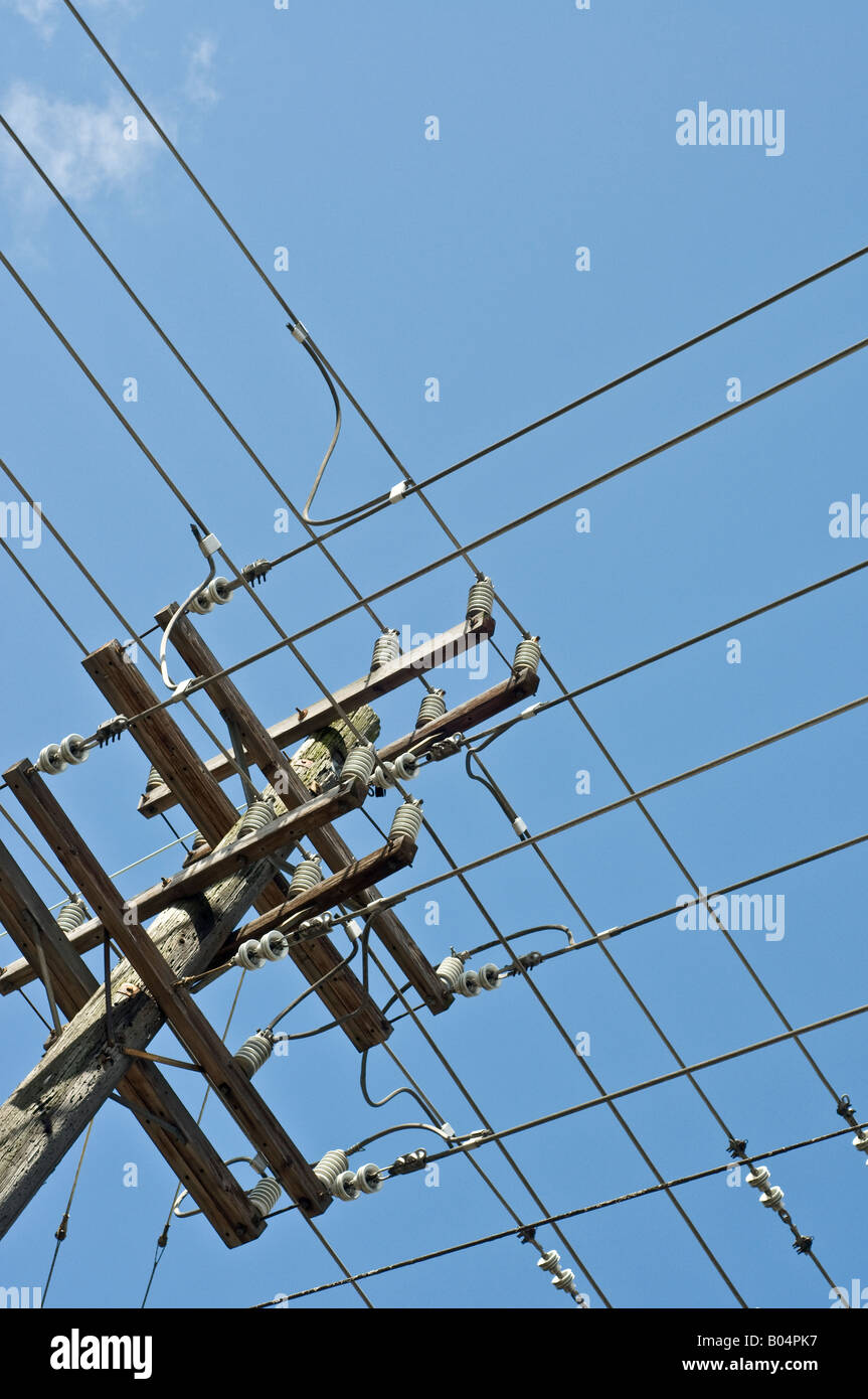 grid of power lines on pole Stock Photo
